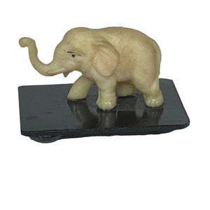 Vintage Celluloid Elephant Figurine  on Black Stand Trunk Up Japan